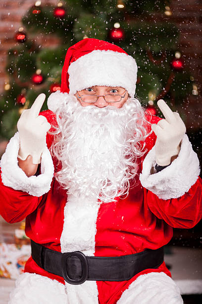 istock Santa Claus Shows The Middle Finger 179124687