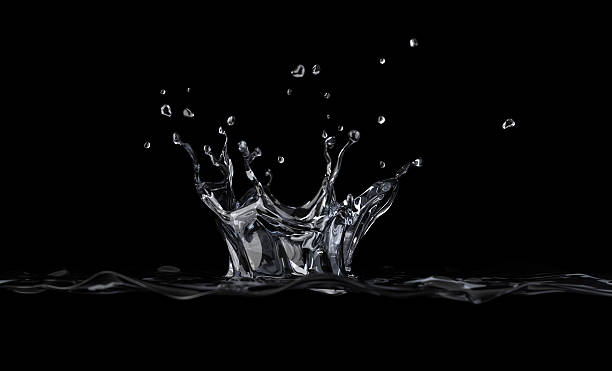 istock Water crown splash viewed from a side, at black background. 179125049