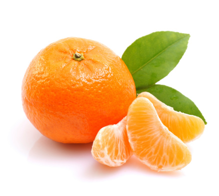 Fresh tangerine on white ground