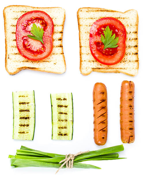 istock Breakfast set of toast bread, tomato, sausage and herbs, isolate 179125302