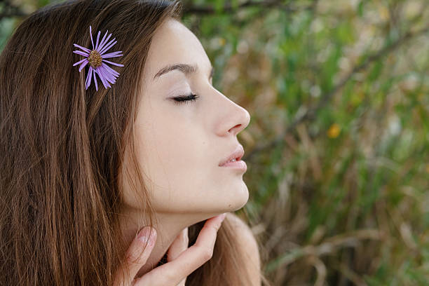 istock young female closeup eyes closed 179125369