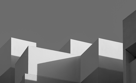 3d rendering of abstract white color cubes on wall. Minimal architecture.