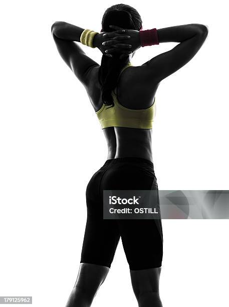 Woman Exercising Fitness Arms Behind Head Silhouette Rear View Stock Photo - Download Image Now