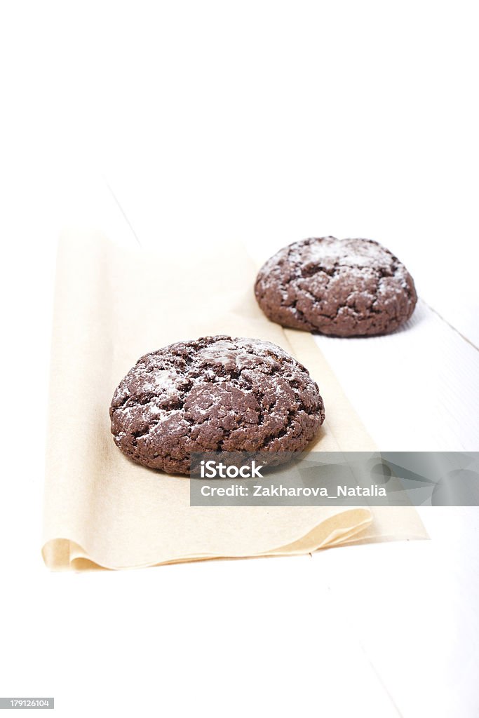 Fresh chocolate cookies on the white background Two fresh chocolate cookies on the white background Baked Stock Photo