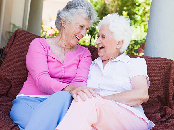 istock Senior female friends chatting together 179126675