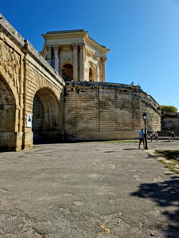 Montpellier Aqueduc de Saint-Clément. This 18th century aqueduct used to bring the city's water over 14 km from the Saint-Clément spring to the water tower in Peyrou. The image shows the construction partially, captured during autumn season.