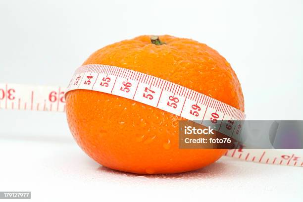 Foto de Laranja E Fita Métrica e mais fotos de stock de Alimentação Não-saudável - Alimentação Não-saudável, Balança, Branco