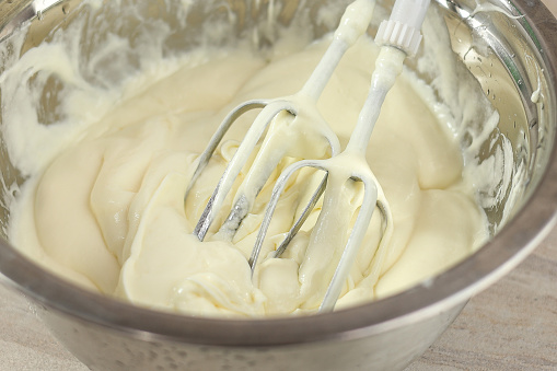 Soft Cream Mixing using Hand Mixer on Stainless Bowl