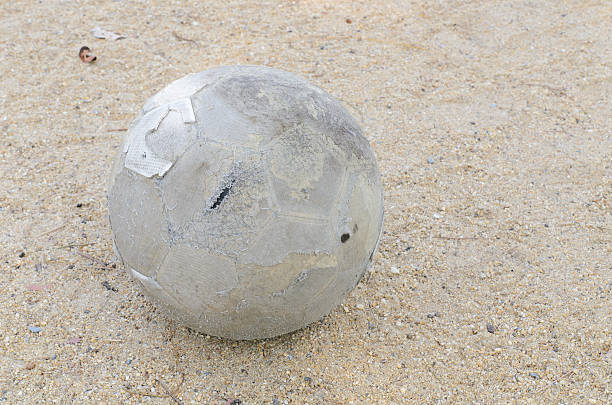 istock old leather football closeup 179129925
