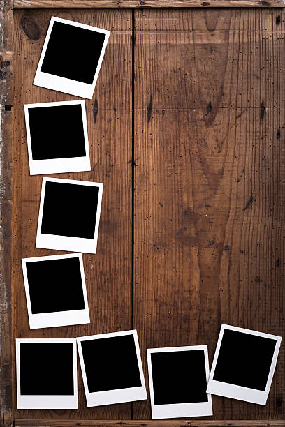 istock Polaroid, photo frame on wood 179131066