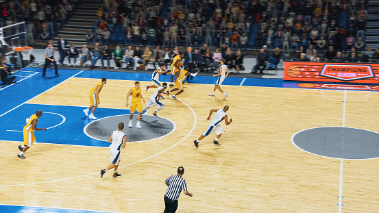 TV Broadcast Style Footage of Two International Teams Playing Basketball at a Professional Arena. Teams Dribble, Pass the Ball, Sucessfuly Score Goals During an Intense World Championship Match.