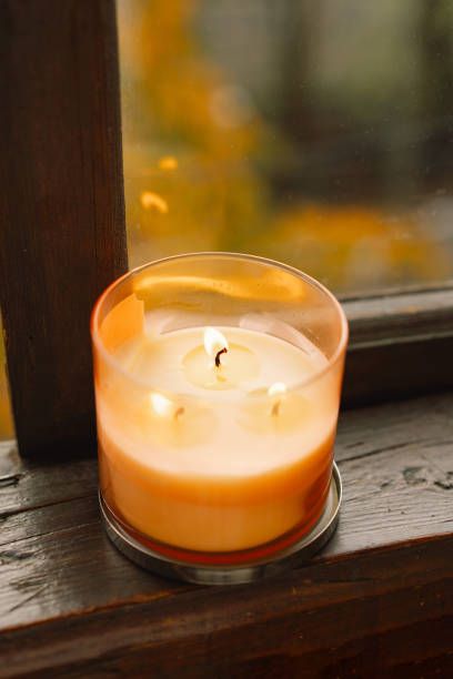 istock Candle and autumn decor. 1791327557