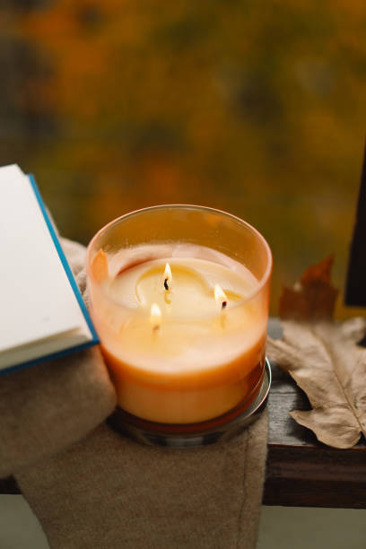 istock Candle and autumn decor. 1791327590