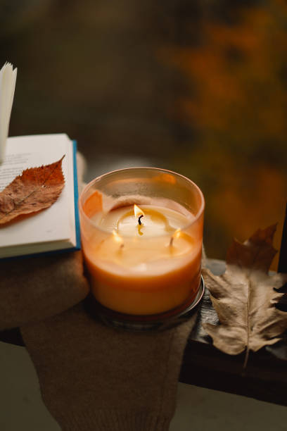 istock Candle and autumn decor. 1791327603