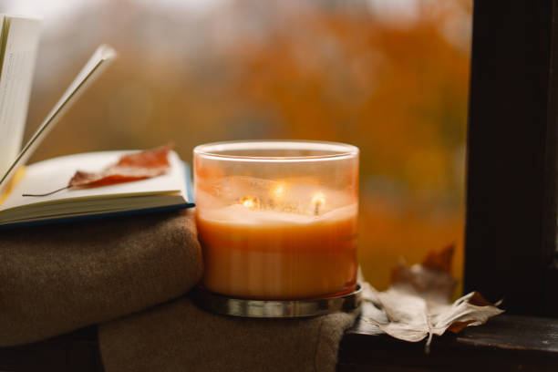 istock Candle and autumn decor. 1791327609