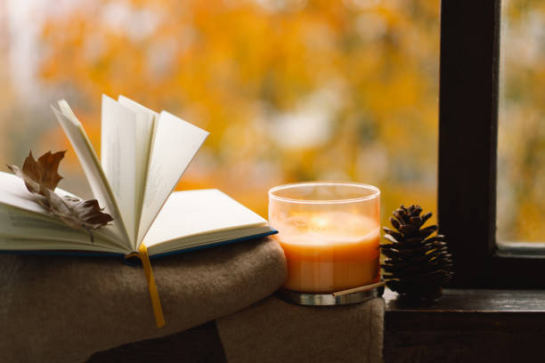 istock Candle and autumn decor. 1791328130