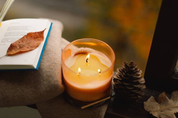 istock Candle and autumn decor. 1791328139