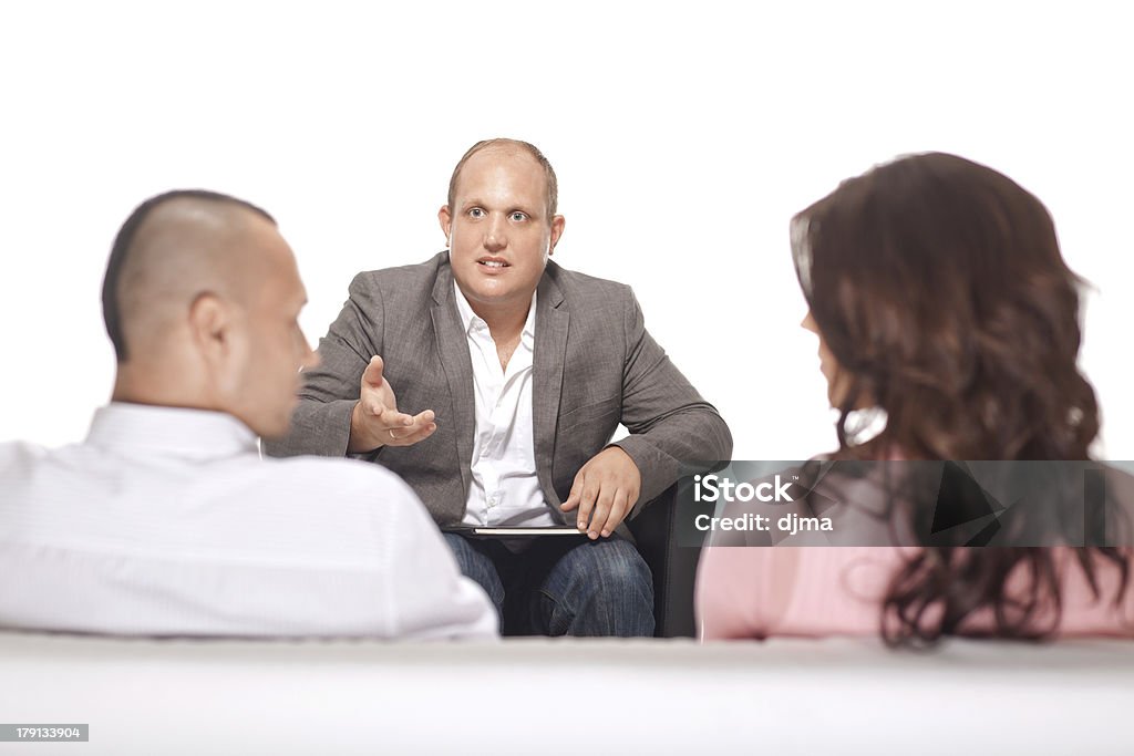 Gruppo di uomini d'affari discutendo - Foto stock royalty-free di Abbigliamento formale