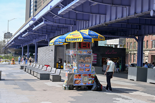 New York City, New York, USA, April 14, 2023 - Fast food kiosk under the FDR Drive at the South Street Viaduct in Manhattan, New York City.