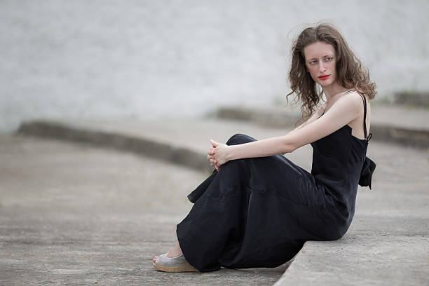 istock Beautiful sad young woman 179134651
