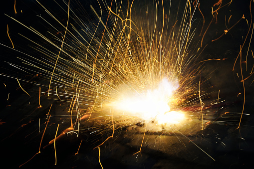 Fireworks in the night. Sparks at night. Indian festival of lights celebrated with exploding fireworks.