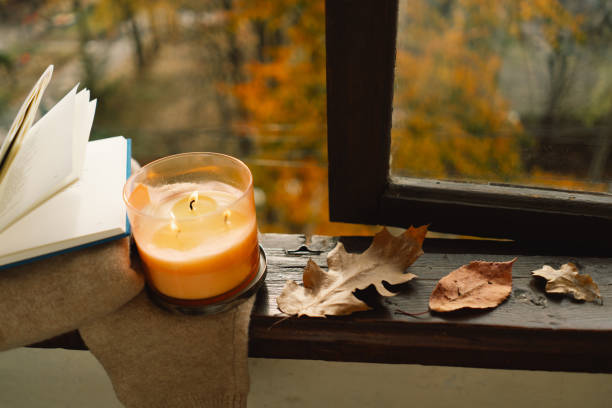 istock Candle and autumn decor. 1791357321