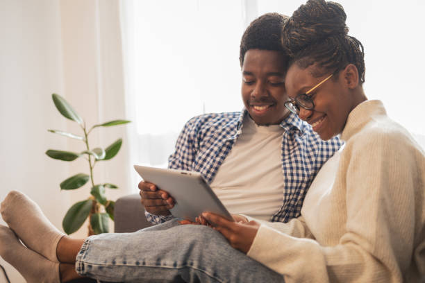 istock Close up portrait of young couple using digital tablet 1791360001