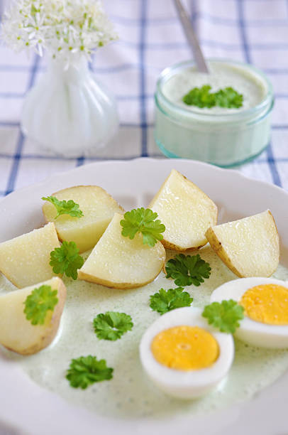 istock Green Sauce with egg and boiled new potatoes 179136497