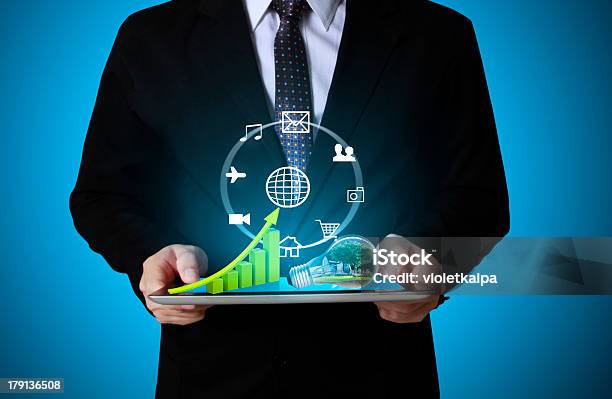 Touch Screen Graph On A Tablet Stock Photo - Download Image Now - Advice, Analyzing, Business