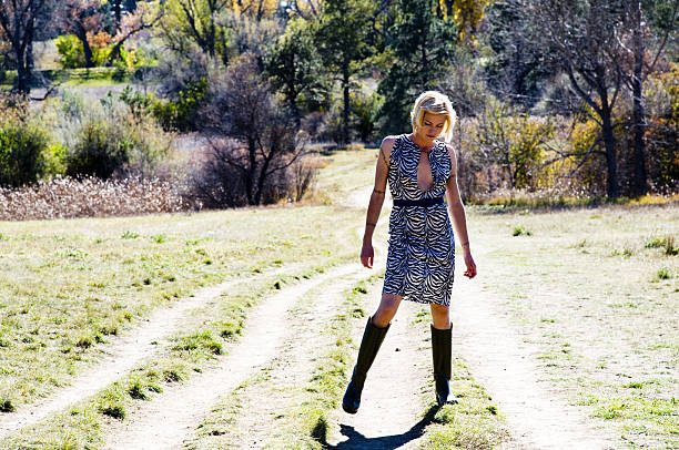 woman on country road stock photo