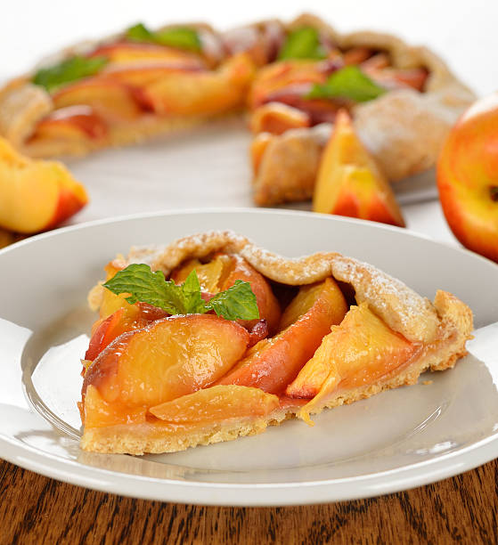 tarte mit nektarinen - peach nectarine fruit portion stock-fotos und bilder