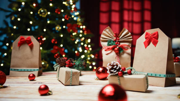 istock Christmas gift with red flake and tree background 1791376943