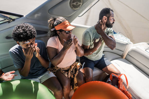 Family applying sunscreen on a speedboat ride