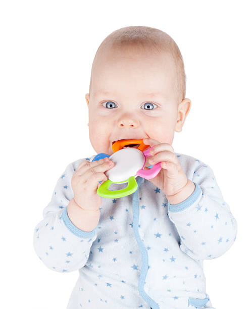 istock Cute baby boy is holding toy 179138112