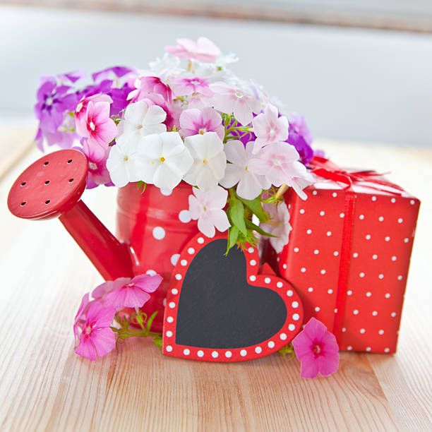 istock Fresh flowers and a little present 179138210