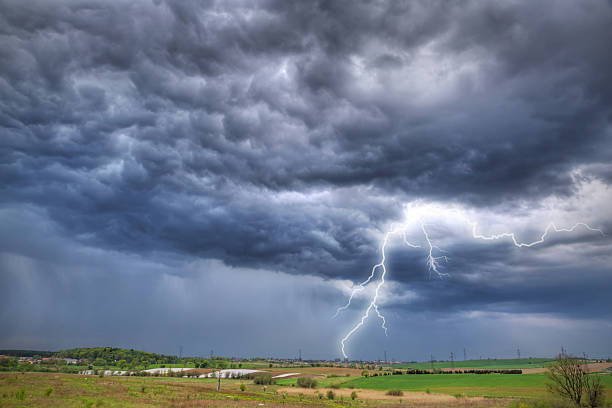 istock Summer thunderstorm over the meadow 179138307