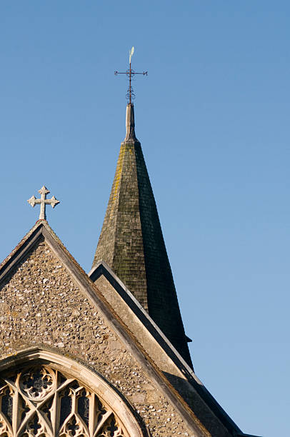 istock Church spire isolated against a blue sky 179138692