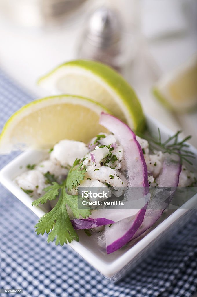 Ceviche Ceviche, decorated with lime, onion and coriander Appetizer Stock Photo