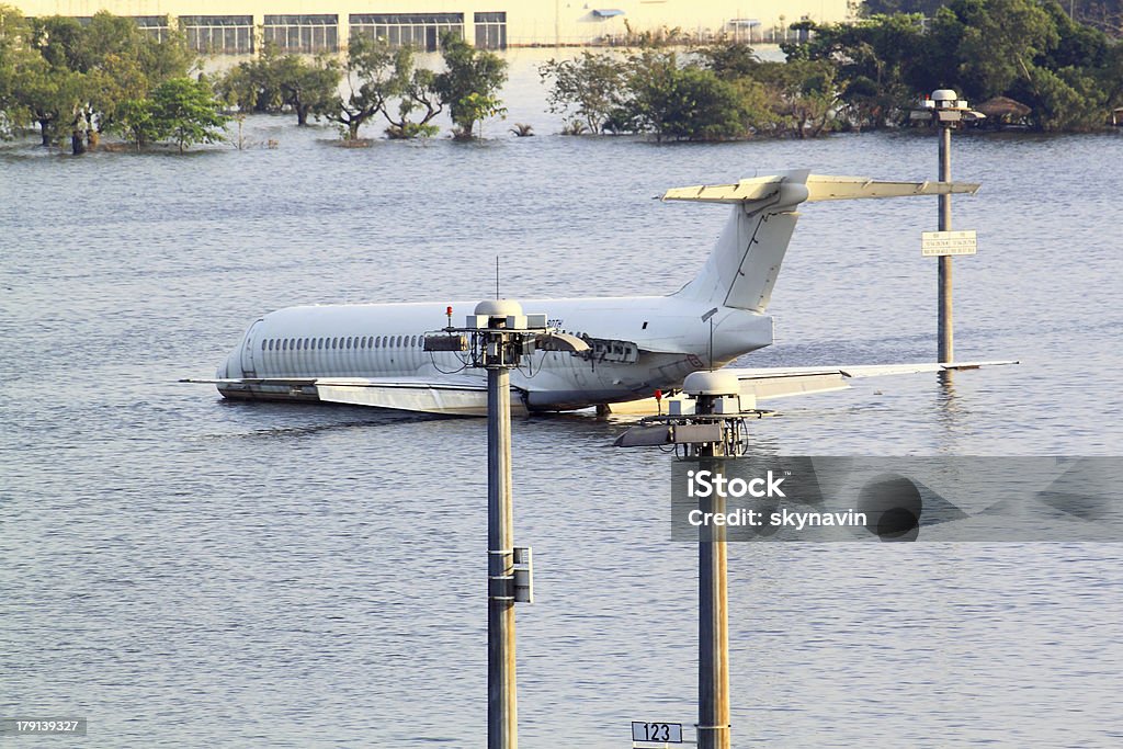 Flooding airport Flooding in airport of Bangkok, Thailand. Airport Stock Photo