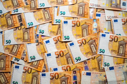 Seamless background made of euro banknotes - pile of money