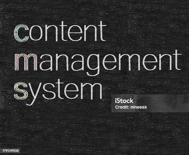 Content Management System Marketing Terms Written On Blackboard Background Stock Photo - Download Image Now