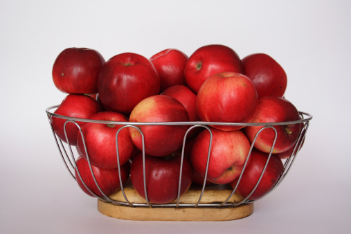 the basket of red apples