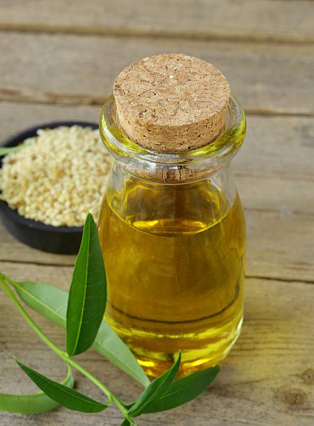 istock sesame seeds and oil on a wooden table 179140470