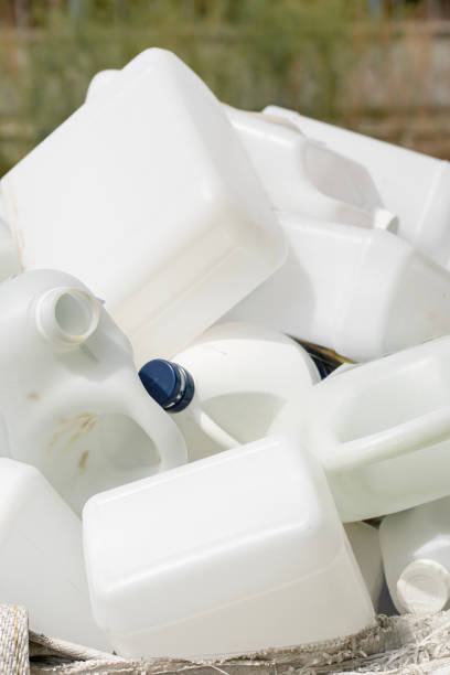 istock Stack of white plastic milk bottles for recycling 1791416013