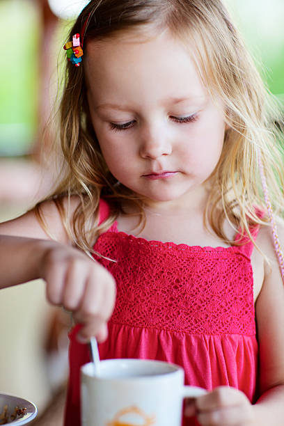 istock Little girl drinking hot chocolate 179141678