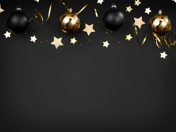 gold and black christmas balls black background