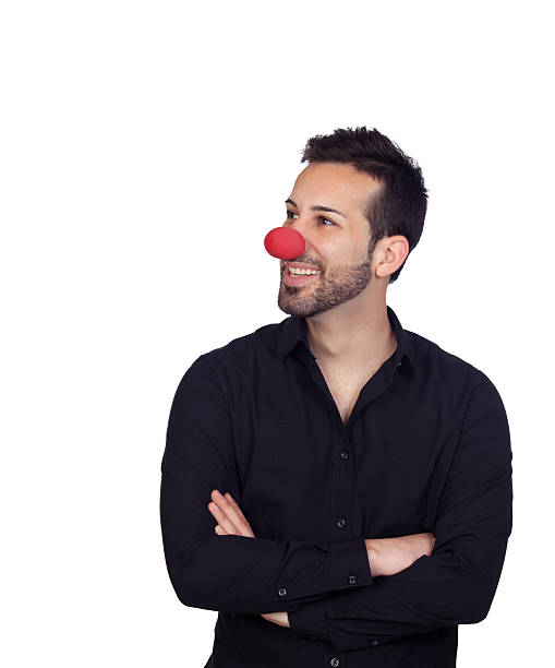 istock Young businessman with clown nose 179141833