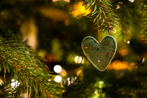 A heart on the Christmas tree isolated for Christmas spirit