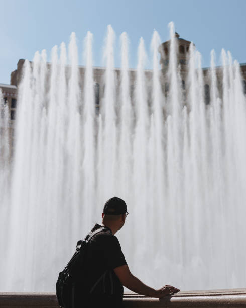 Las Vegas. USA. 10.25.2023. Beautiful view of Bellagio Hotel casino with fountains creating magical ambiance against backdrop of evening sky.