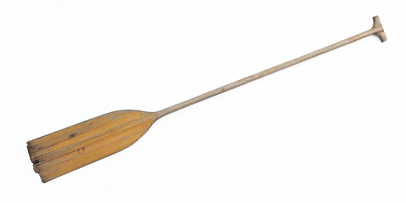 vintage wooden paddle isolated on white background